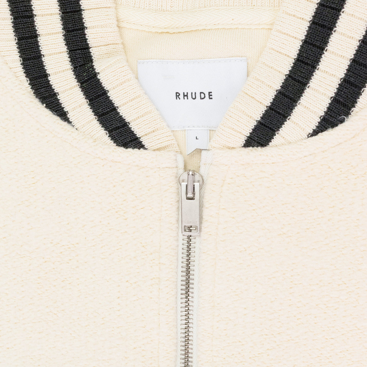 CREAM QUARTER ZIP VARSITY SWEATER