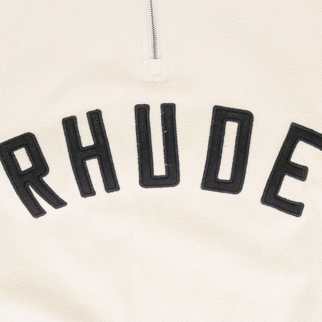 CREAM QUARTER ZIP VARSITY SWEATER