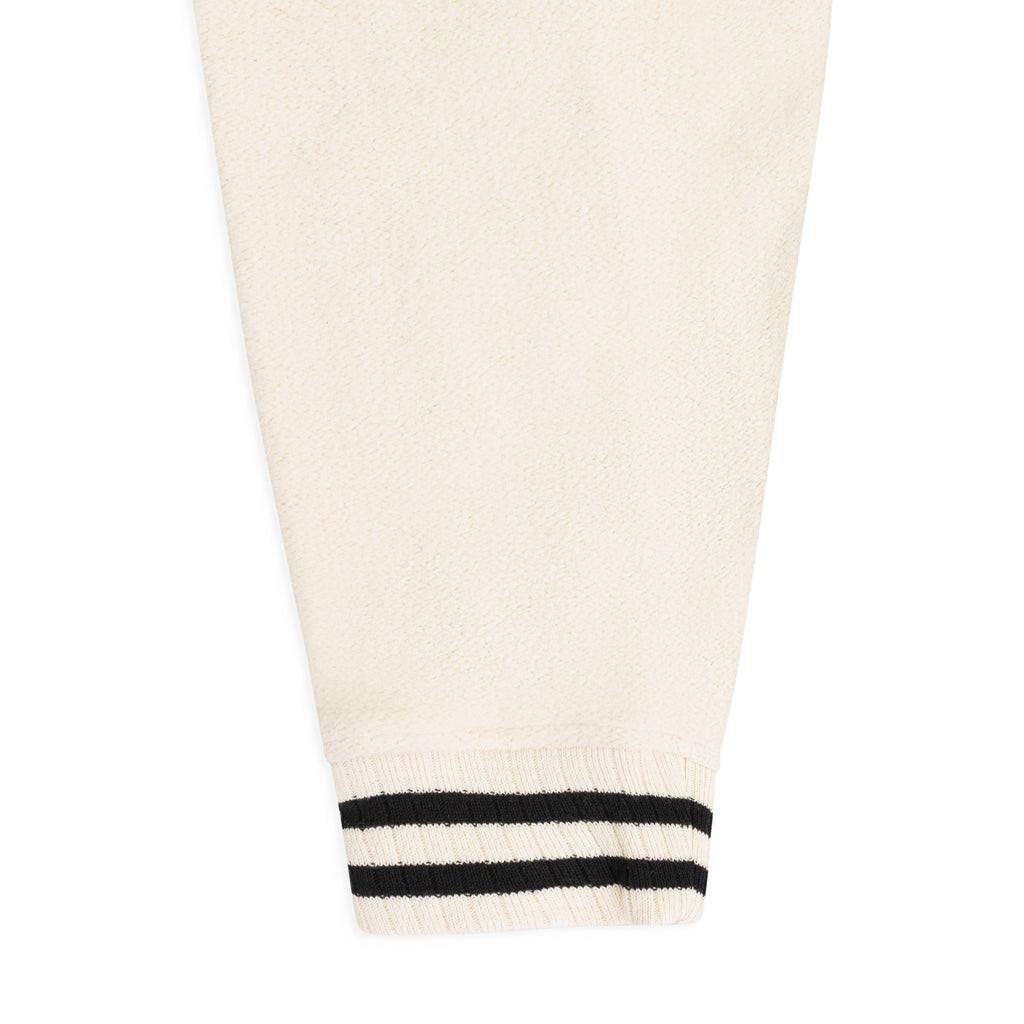 CREAM QUARTER ZIP VARSITY SWEATER