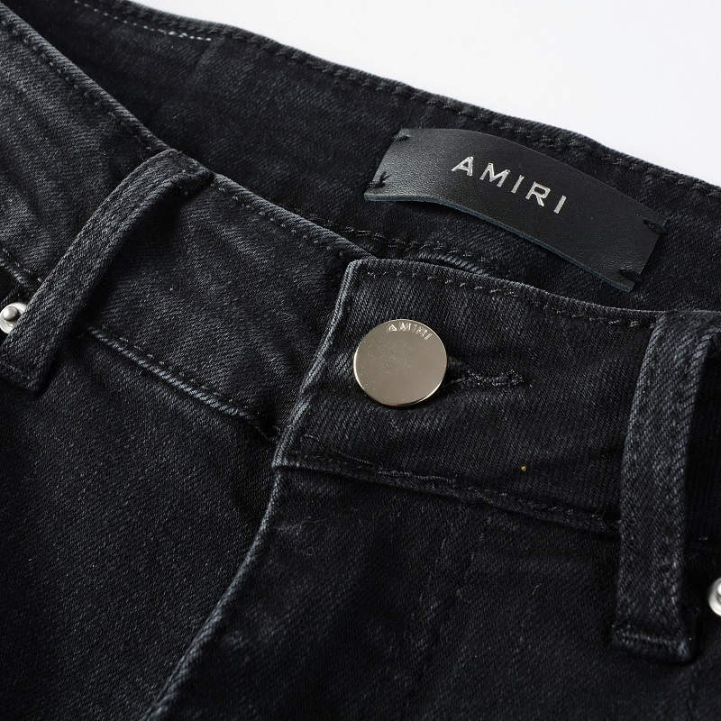 AMIRI Patchwork Slim Jeans – Full Logo Distressed Denim
