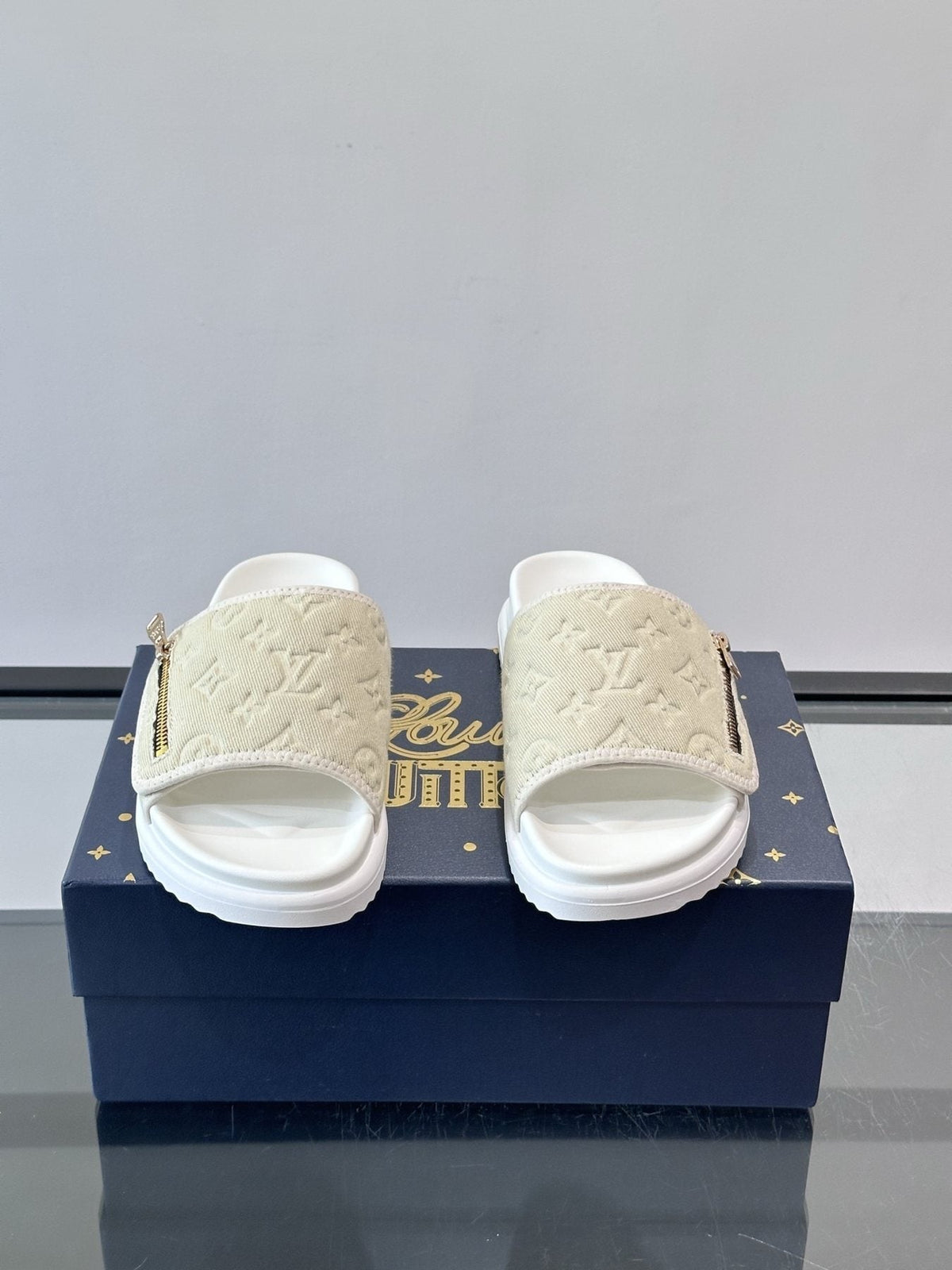 Louis Vuitton Embossed Monogram Slide Sandals